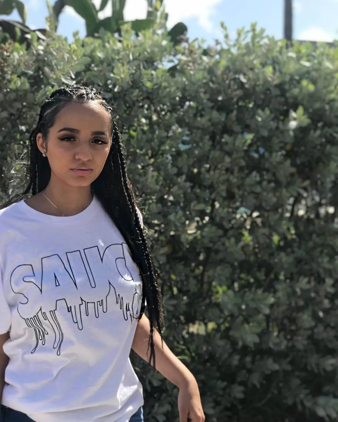 Black Sauce Outline | White Tee (Solid Checkered Drippin Sleeve)