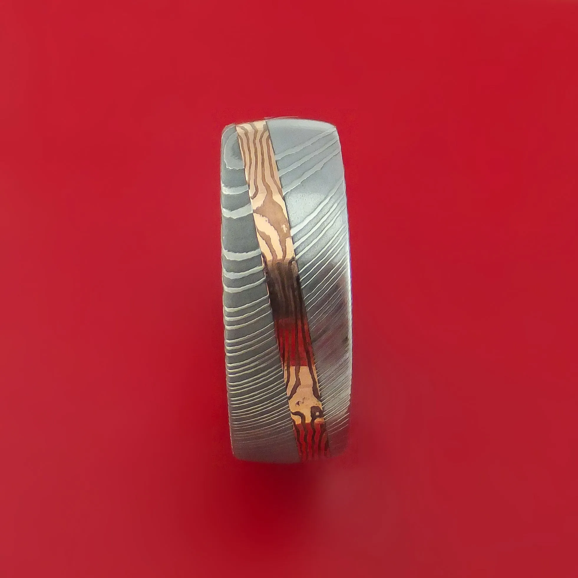 Damascus Steel Ring with Diagonal Rose Gold Mokume Shakudo Inlay and Gold Sleeve Custom Made