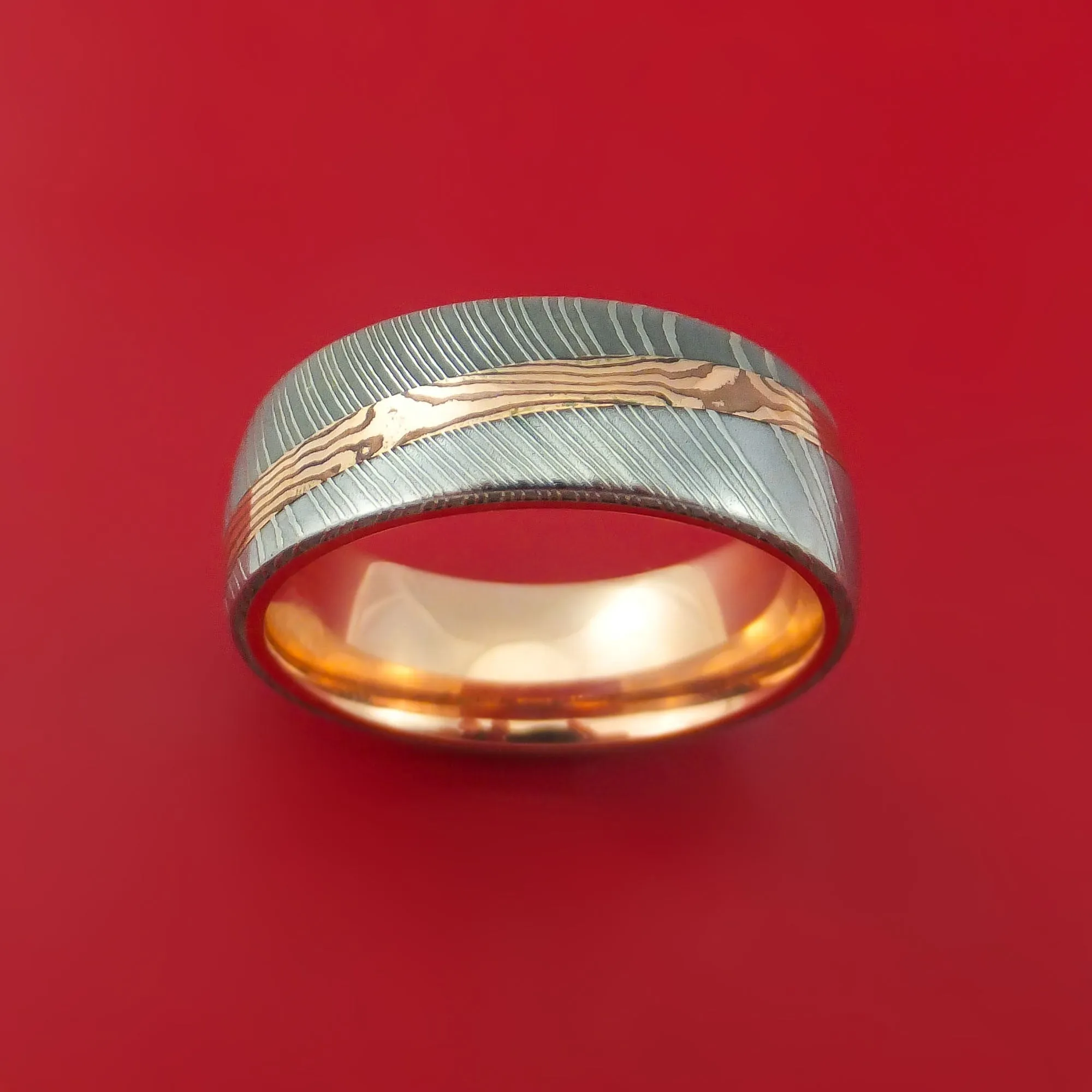 Damascus Steel Ring with Diagonal Rose Gold Mokume Shakudo Inlay and Gold Sleeve Custom Made