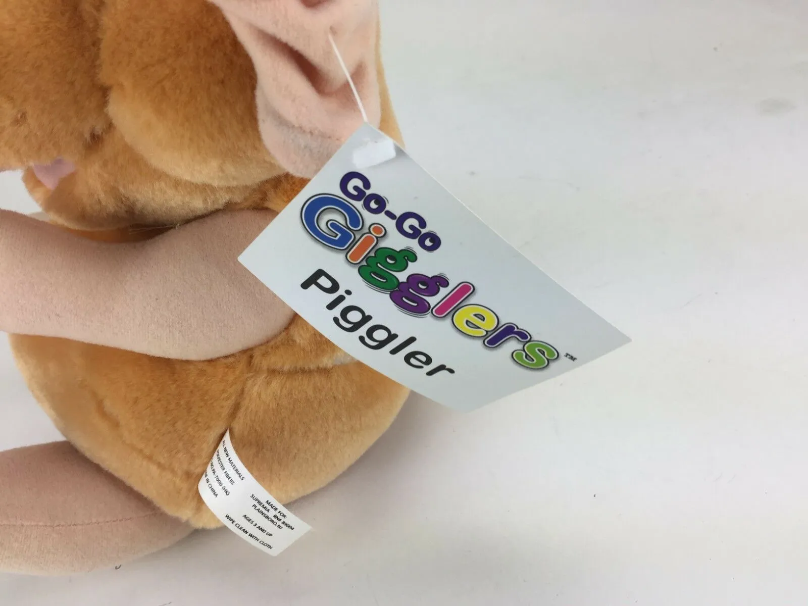 Go-Go Gigglers Piggler Laughing Plush