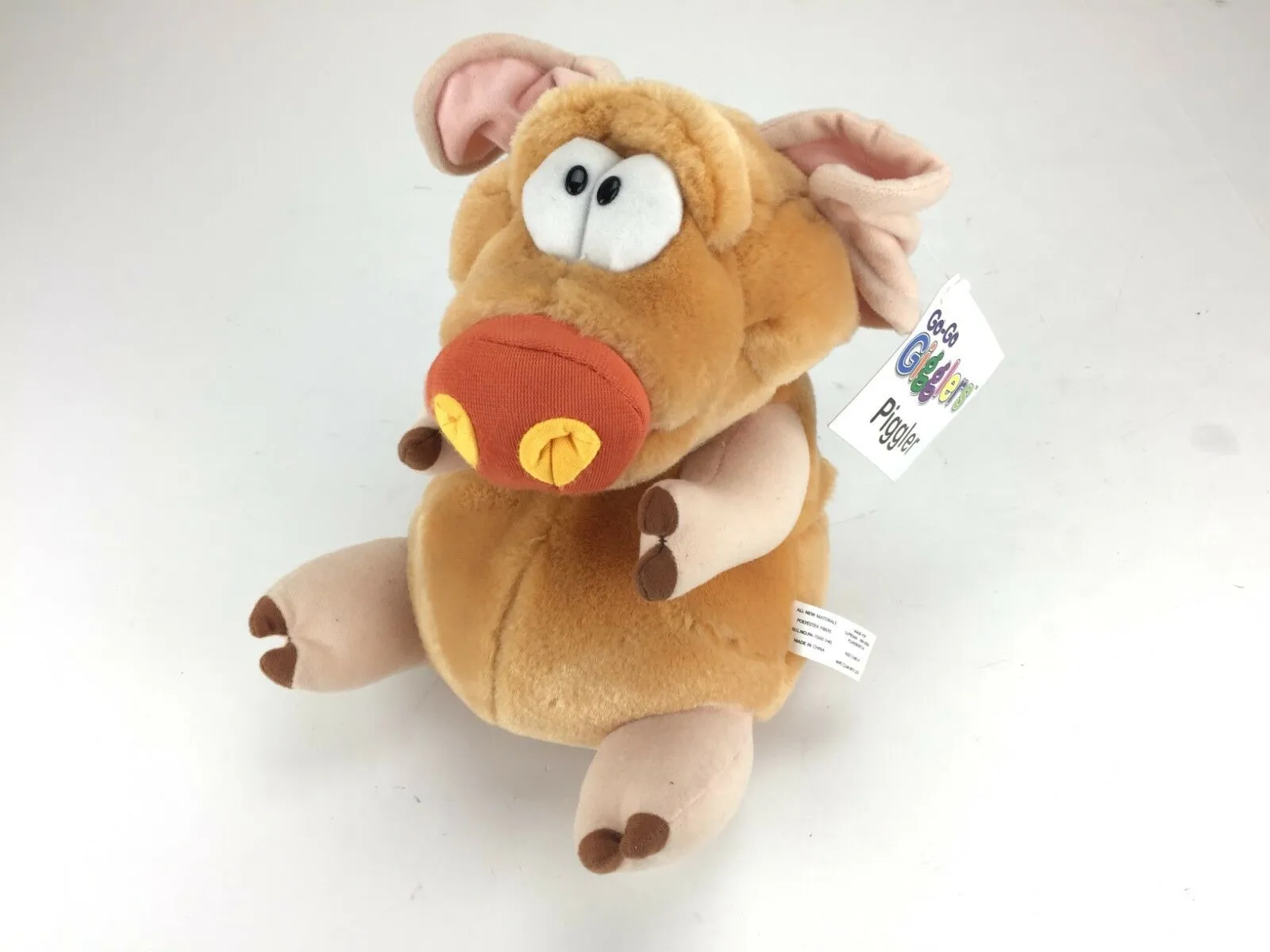 Go-Go Gigglers Piggler Laughing Plush