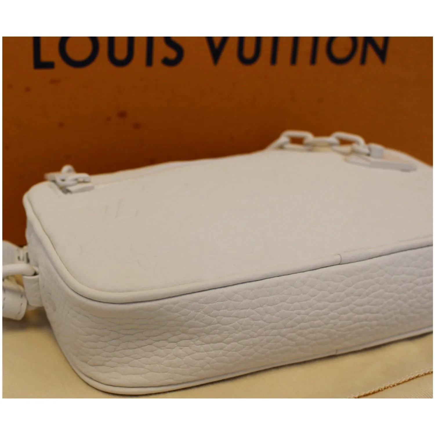 LOUIS VUITTON Pochette Volga Monogram Clutch Bag White