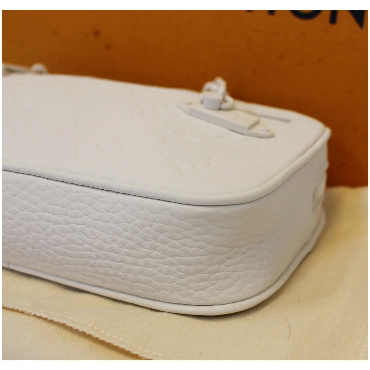 LOUIS VUITTON Pochette Volga Monogram Clutch Bag White