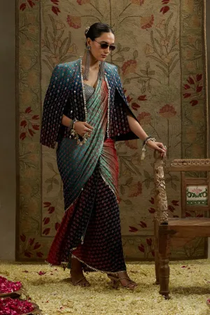 Red & Blue Ombre Print Cascade Saree With Metal Embellished Bustier Paired With Blue Ombre Embellished Cape Jacket