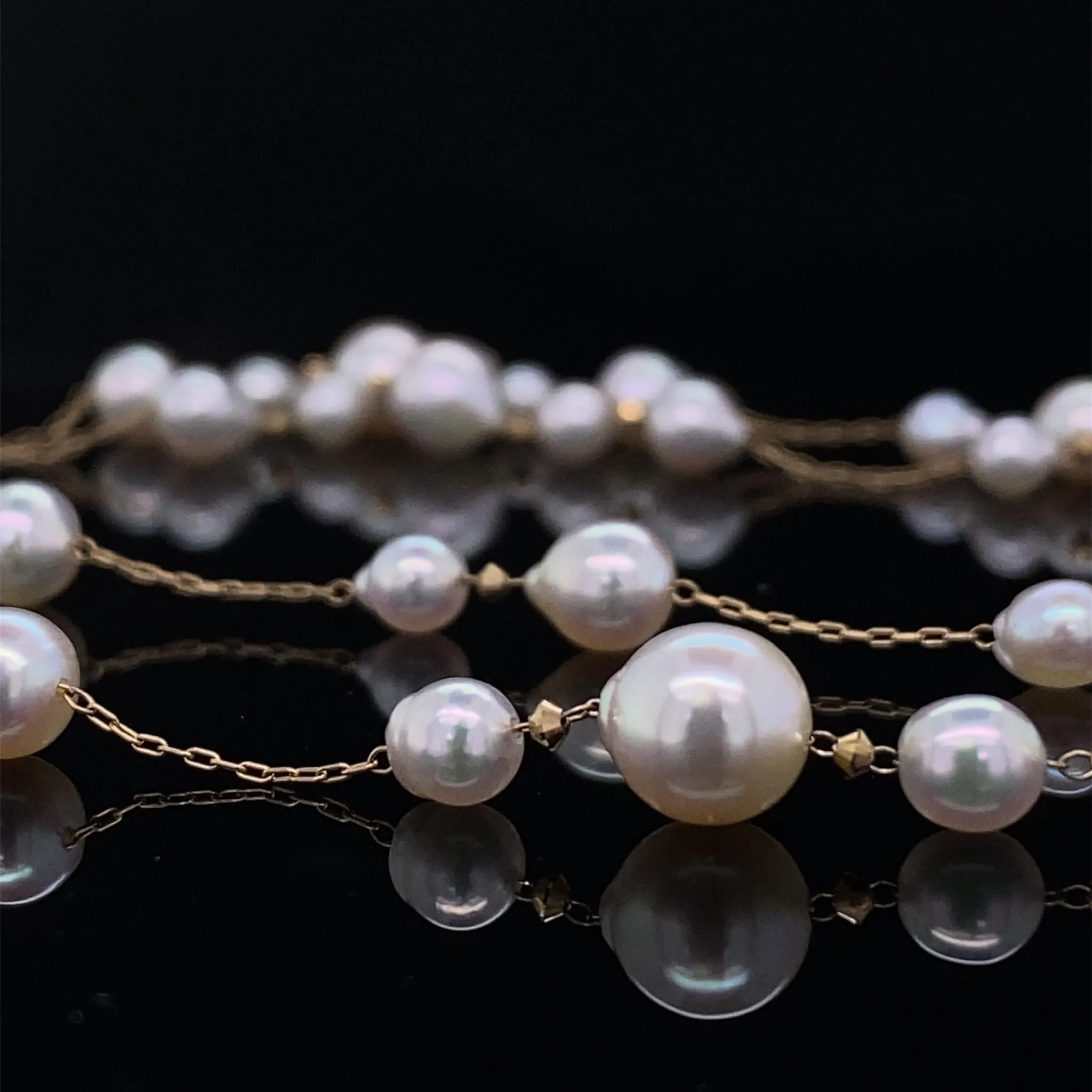 Sparkling Faceted Gold Adorned Pearls And Chain
