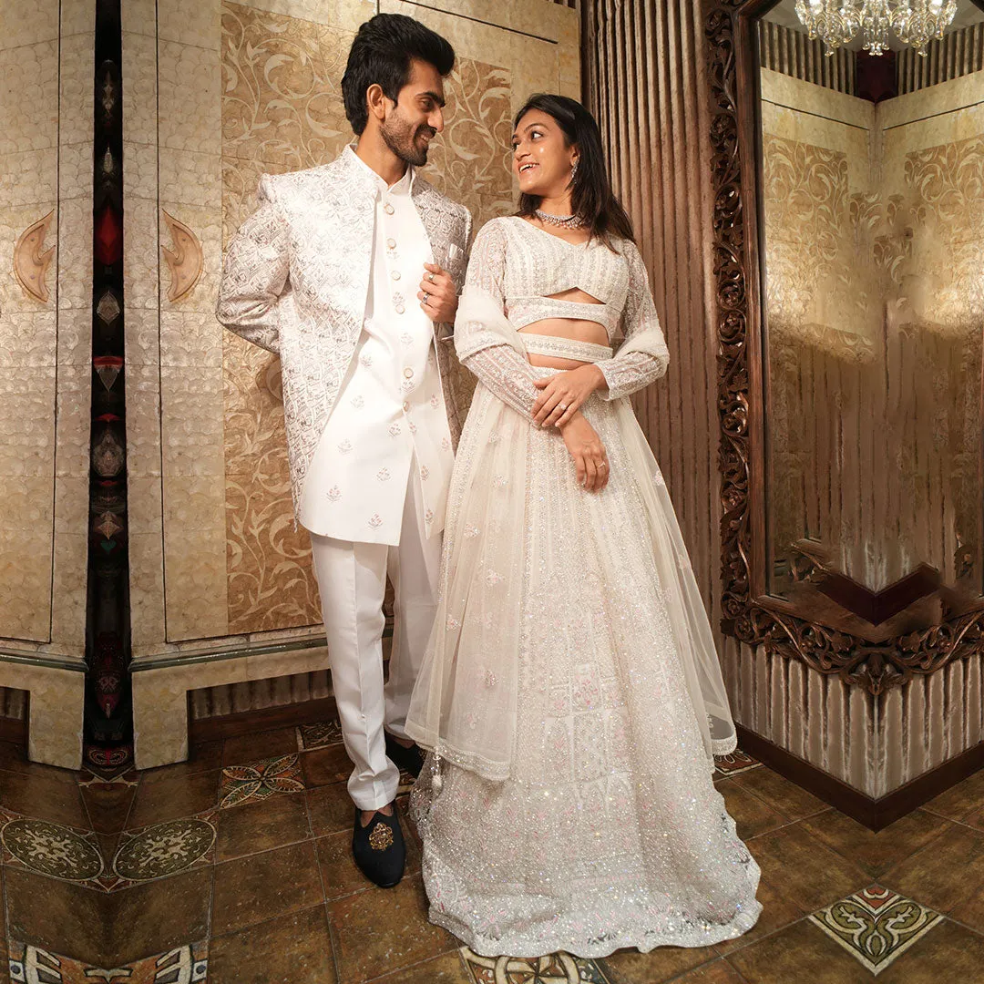 Twinning White Silhouette Sherwani for Men Paired with Lehenga Set for Women