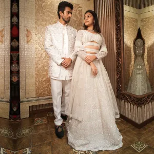 Twinning White Silhouette Sherwani for Men Paired with Lehenga Set for Women