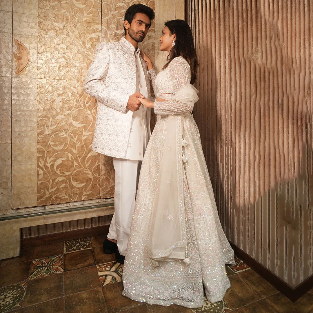 Twinning White Silhouette Sherwani for Men Paired with Lehenga Set for Women