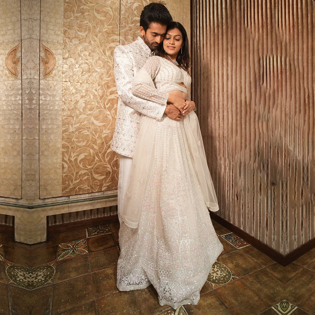 Twinning White Silhouette Sherwani for Men Paired with Lehenga Set for Women